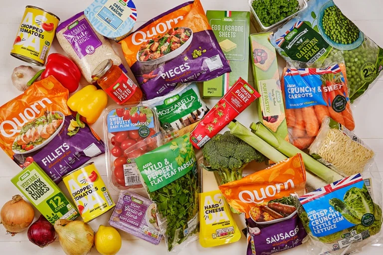 An assortment of products, including Quorn Fillets, Quorn Pieces and Quorn Sausages alongside other products such as vegetables and dry foods. 