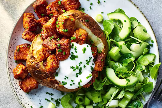 Jacket potato with Quorn Pieces in a BBQ sauce, with a salad on the side