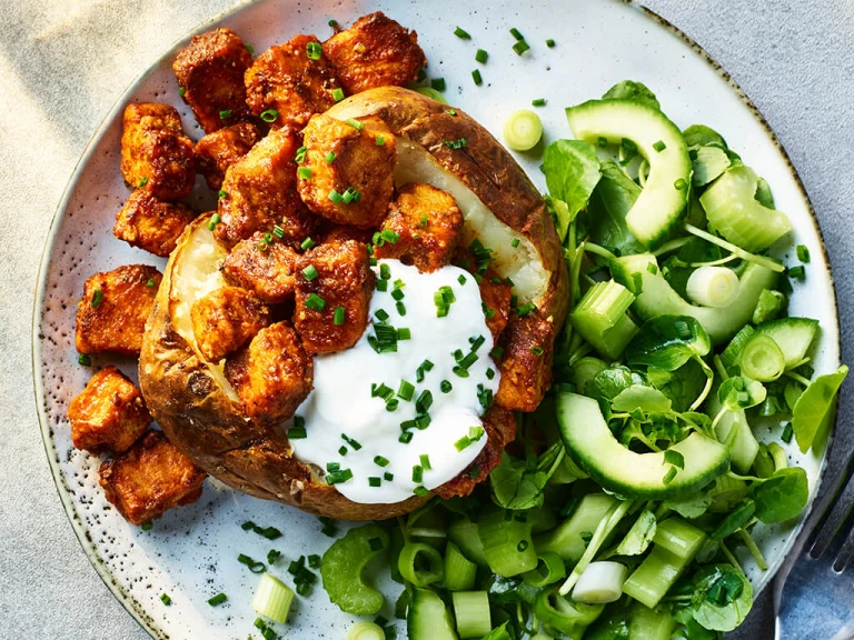 Jacket potato with Quorn Pieces in a BBQ sauce, with a salad on the side