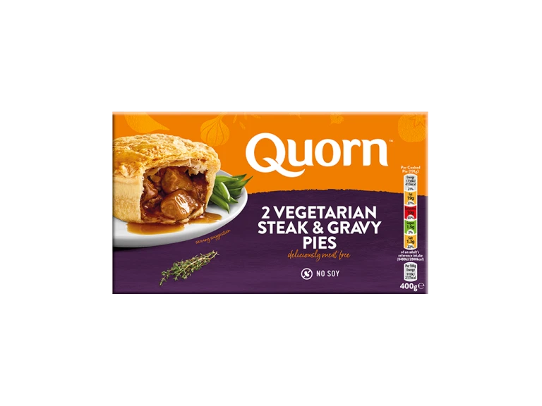 A box of Quorn Steak & Gravy Pies showing the prepared product and information on an orange and charcoal background.