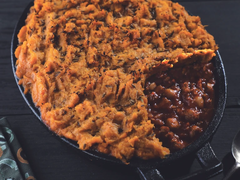 Vegetarian Sweet Potato Cottage Pie, made with Quorn Mince, apricots, chickpeas and served in a casserole dish.