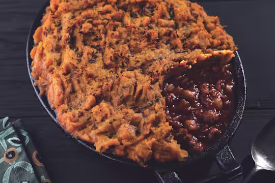 Vegetarian Sweet Potato Cottage Pie, made with Quorn Mince, apricots, chickpeas and served in a casserole dish.