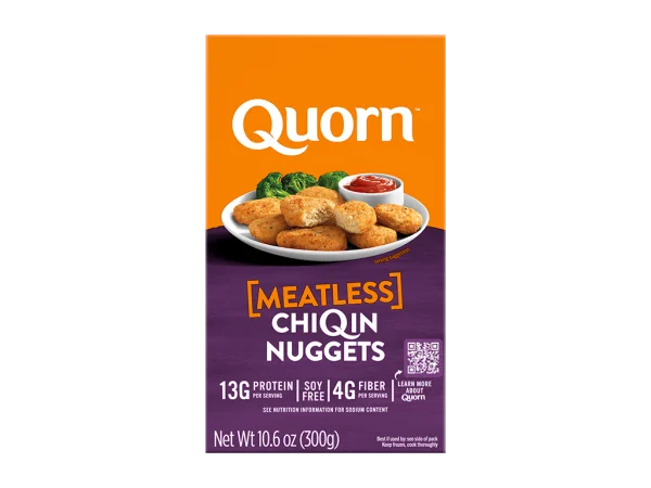 A box of Quorn Meatless Nuggets showing the plates product and information on an orange and charcoal background.