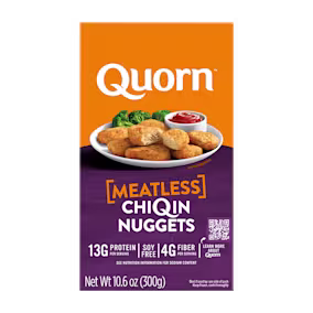 A box of Quorn Meatless Nuggets showing the plates product and information on an orange and charcoal background.