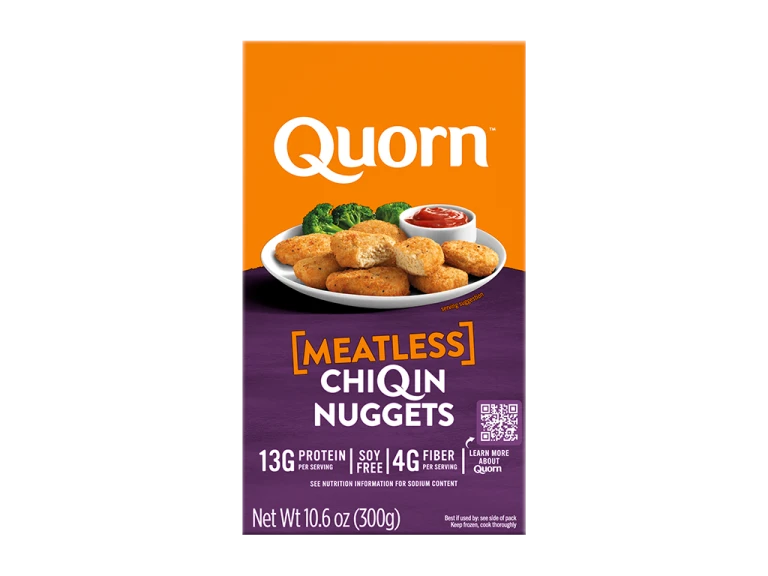 A box of Quorn Meatless Nuggets showing the plates product and information on an orange and charcoal background.