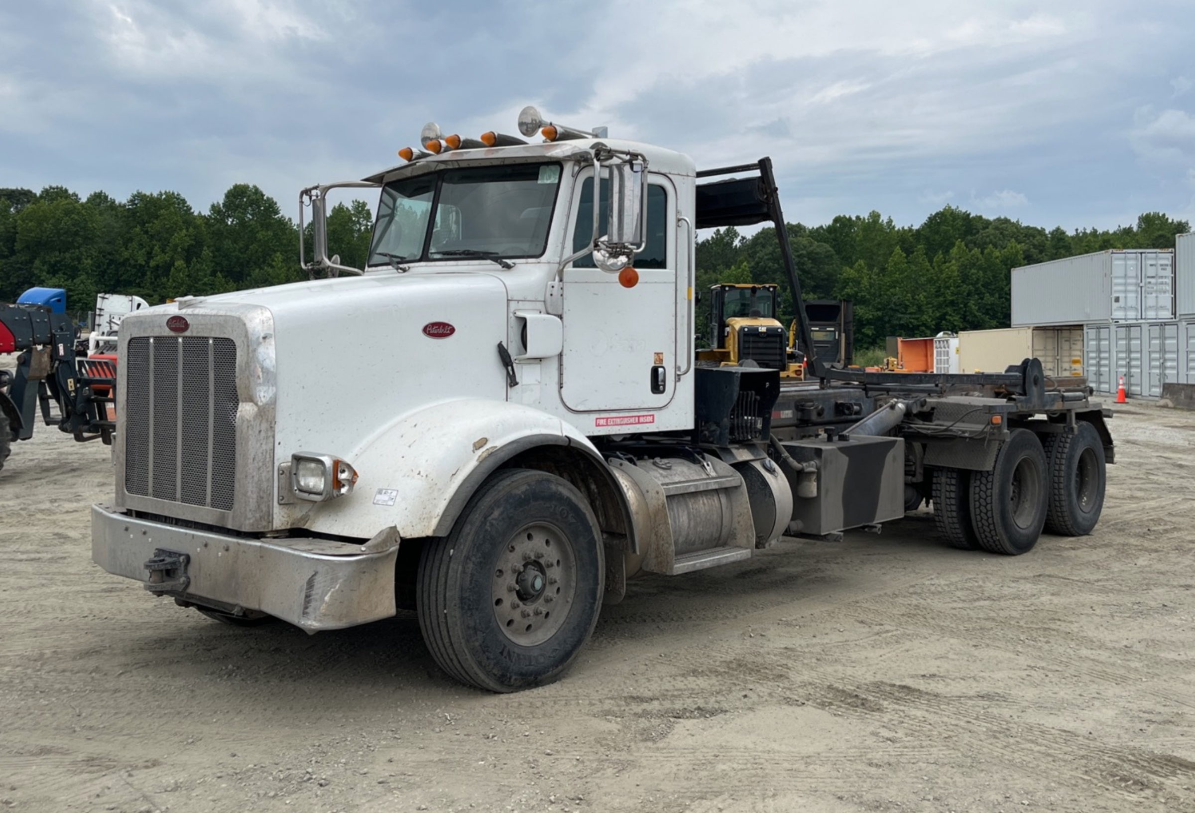 Used Roll Off Trucks & Trash Trucks For Sale | Ritchie Bros. Auctioneers