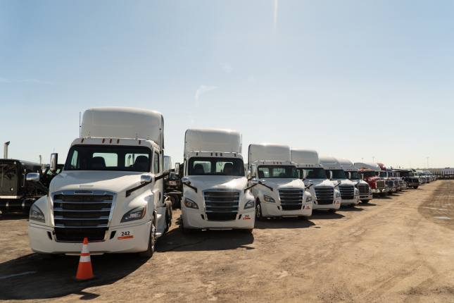 Equipment inspector reviewing warranty