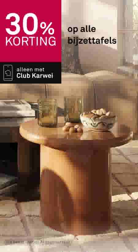 30% korting op alle bijzettafels, alleen met Club Karwei. Moderne ronde houten bijzettafel met glazen en kom in woonkamer.