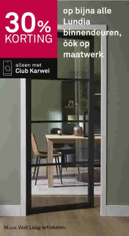 30% korting op Lundia binnendeuren en maatwerk met Club Karwei, zwarte glazen deur met zicht op eetkamer.