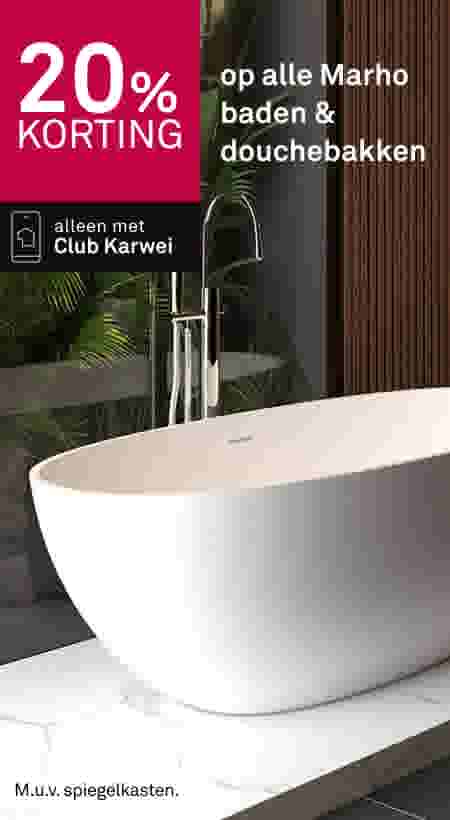 Moderne witte vrijstaand bad in luxe badkamer met tropische planten en 20% korting op Marho baden en douchebakken.