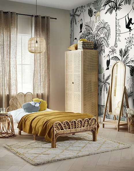 Jungle kinderkamer met okergeel en rotan