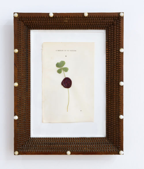 Miles Huston
World Stage, 2022
Four leaf clover, wax, book page, Tramp art frame
12 x 9 inches
30.5 x 22.9 cm