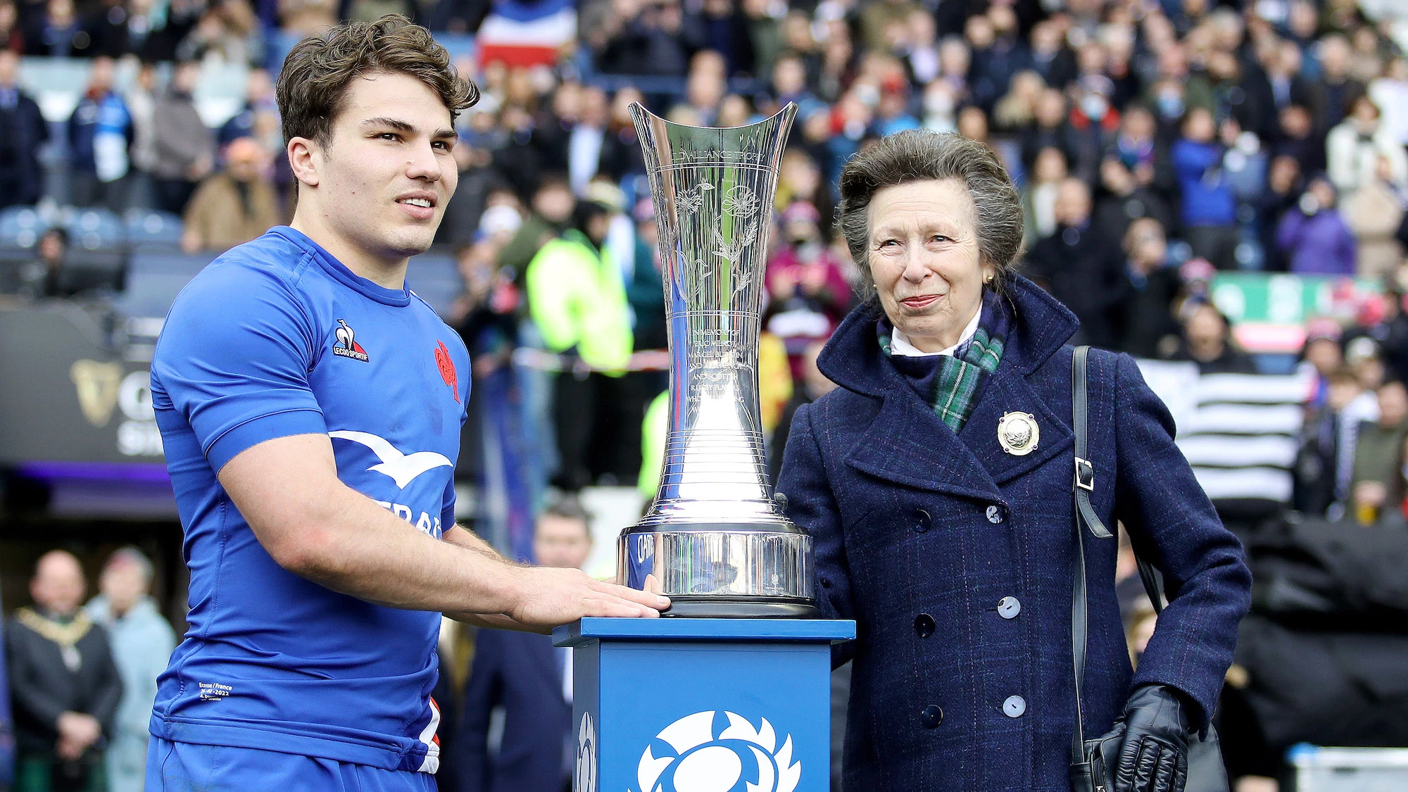 Antoine Dupont is presented with the Auld Alliance Trophy by Princess Anne 26/2/2022