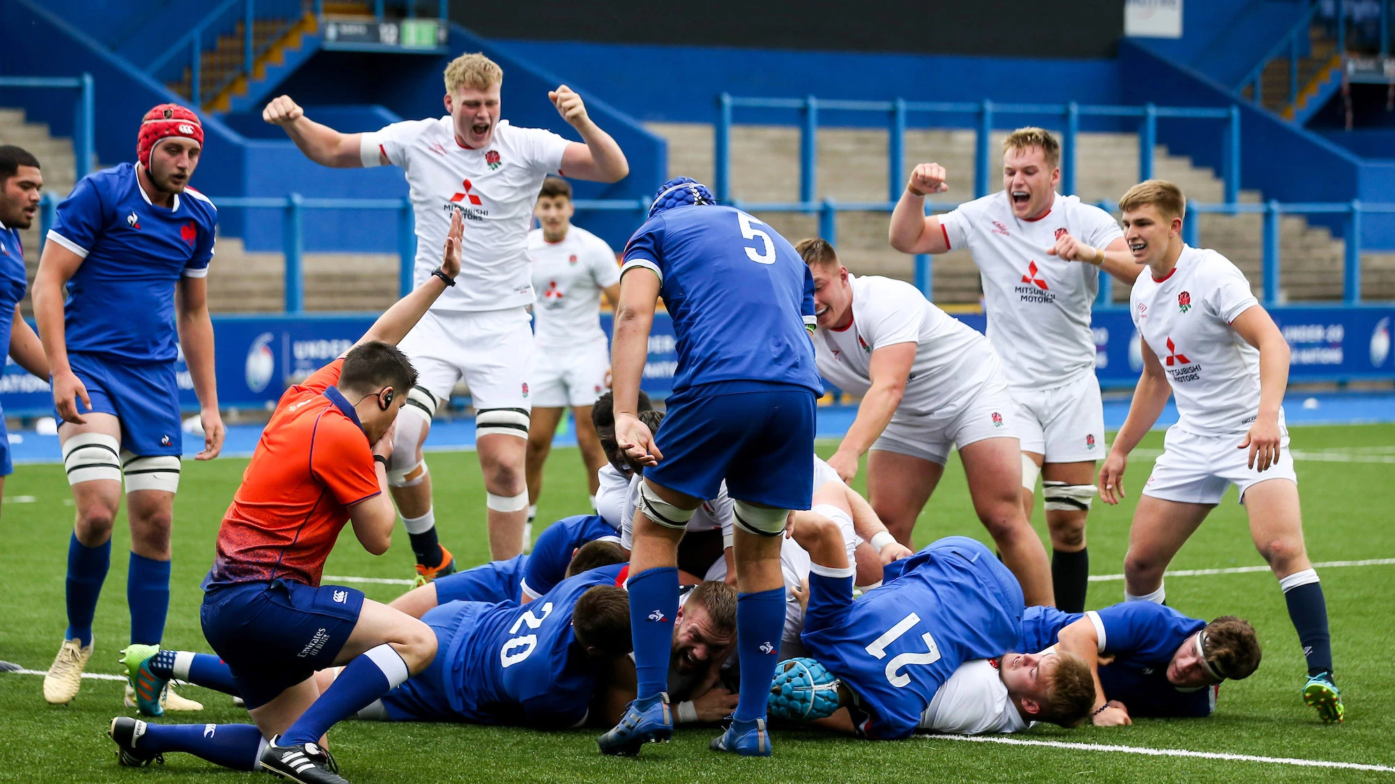 England players celebrate after Sam Riley scores a try 19/6/2021
