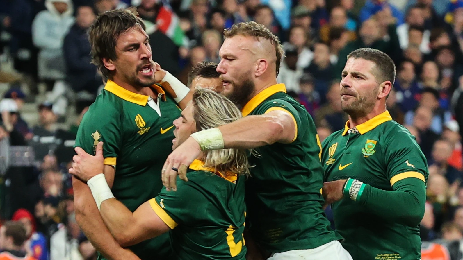 Faf de Klerk and RG Snyman celebrate after Eben Etzebeth scores a try, 2023