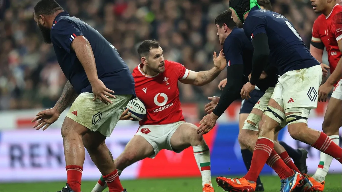 Wales' Tomos Williams tries to evade the onrushing French defence in the 2025 Championship.