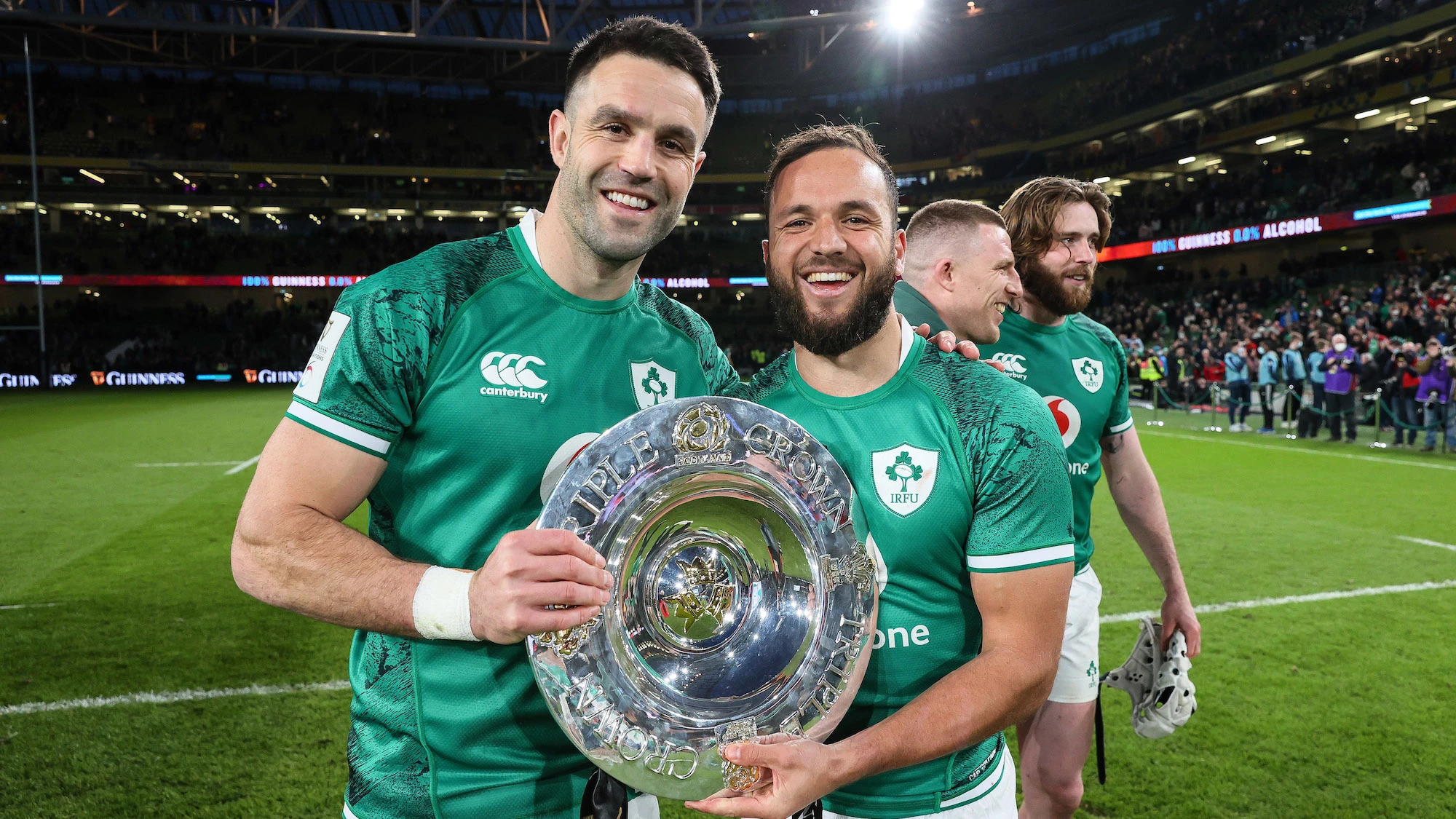 Conor Murray and Jamison-Gibson Park celebrate winning with the Triple Crown trophy 19/3/2022