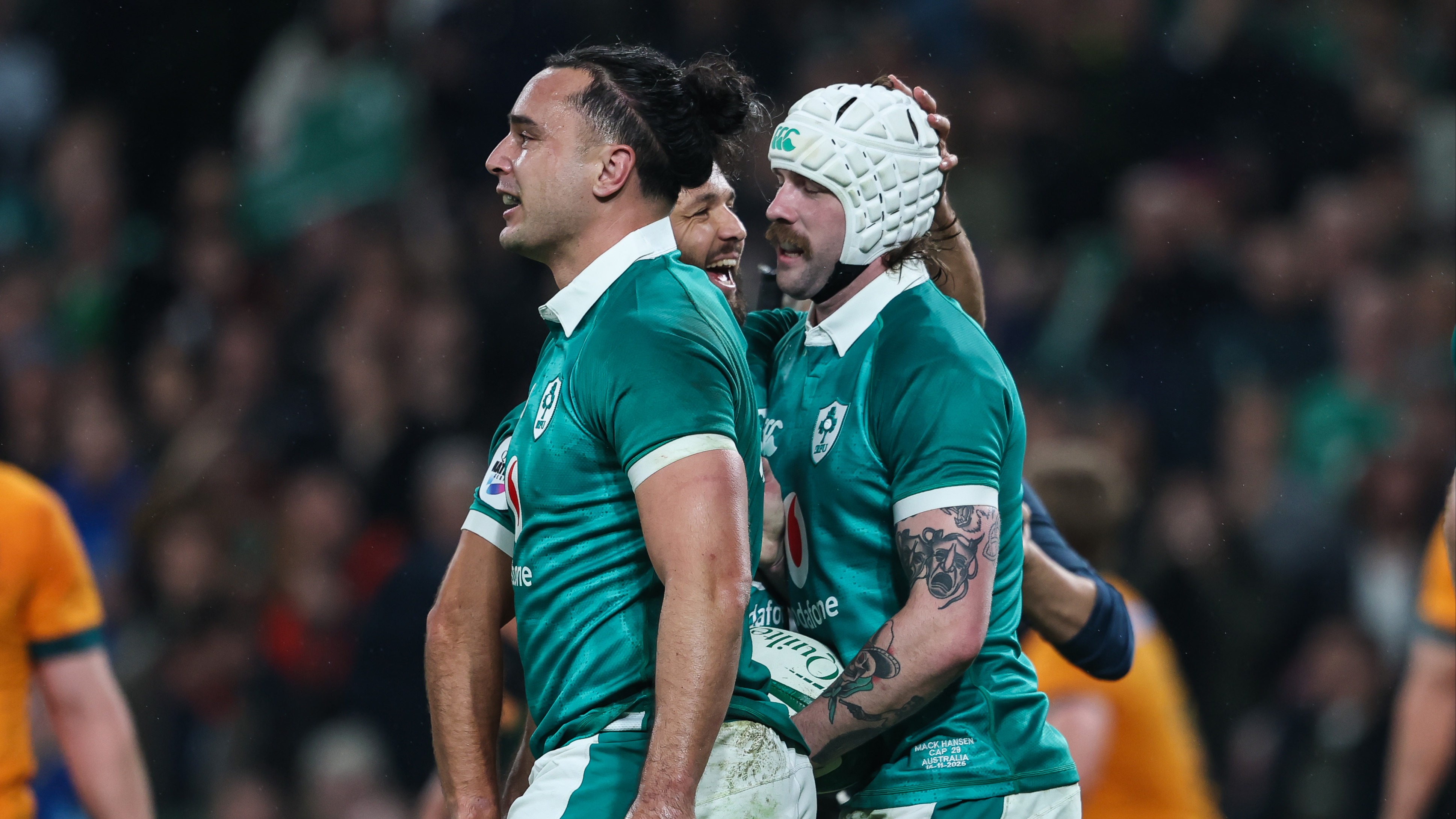 Ireland’s Mack Hansen celebrates scoring his side's second try of the match against Australia with Jamison Gibson-Park and James Lowe. 