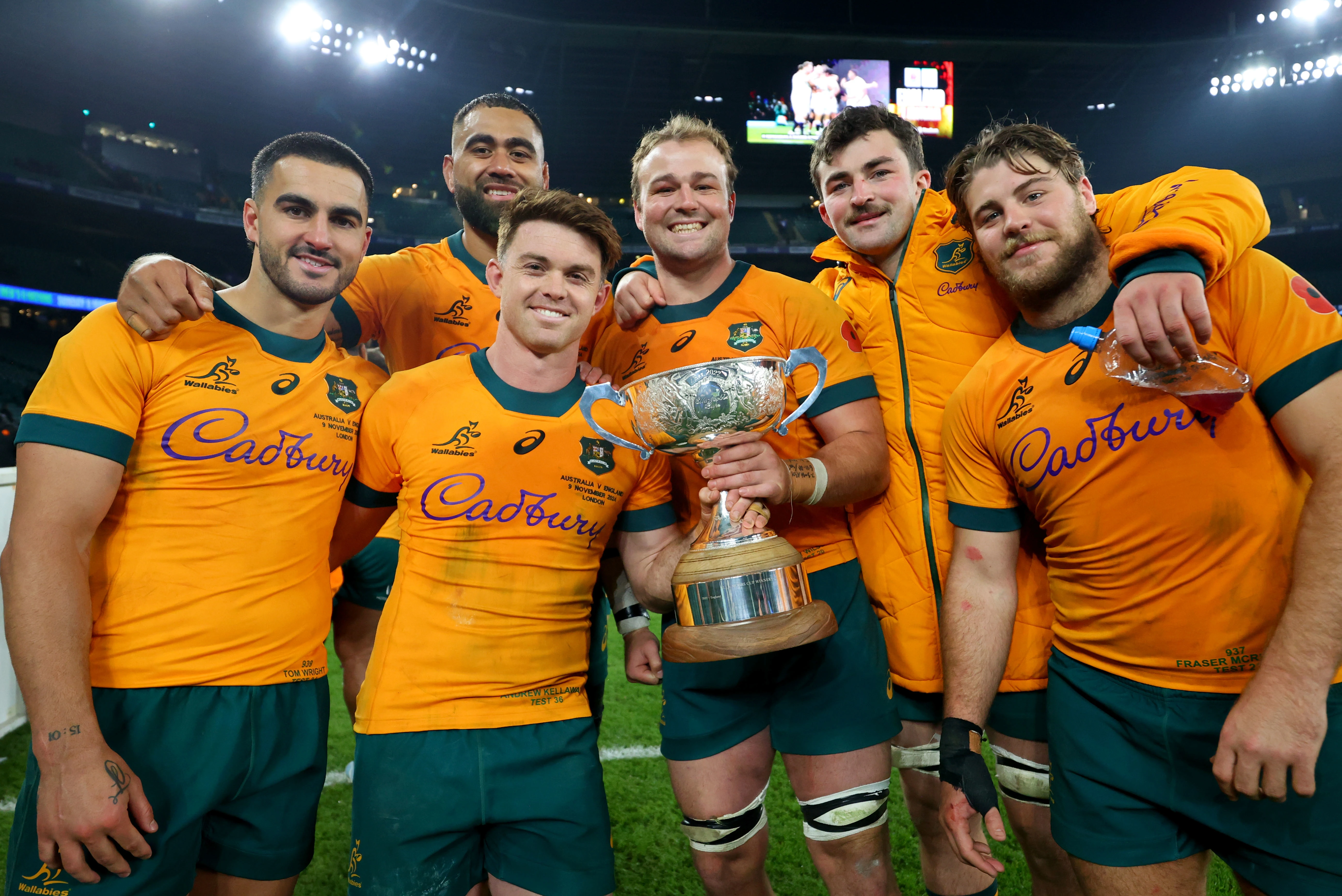 Wallabies celebrate beating England