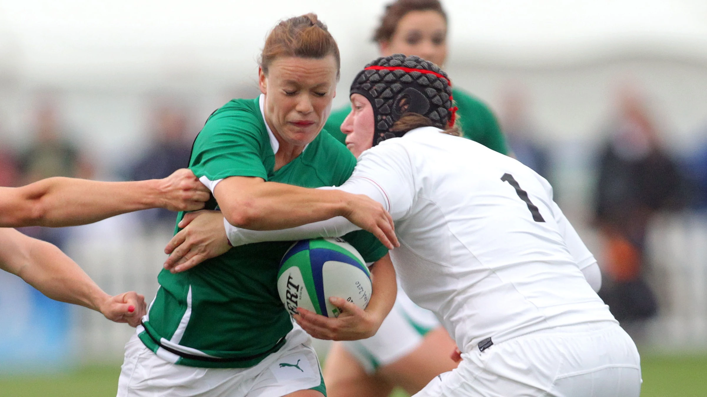 Ireland's Lynne Cantwell tries to break through the tackle of England's Rochelle Clark in the 2010 Championship.