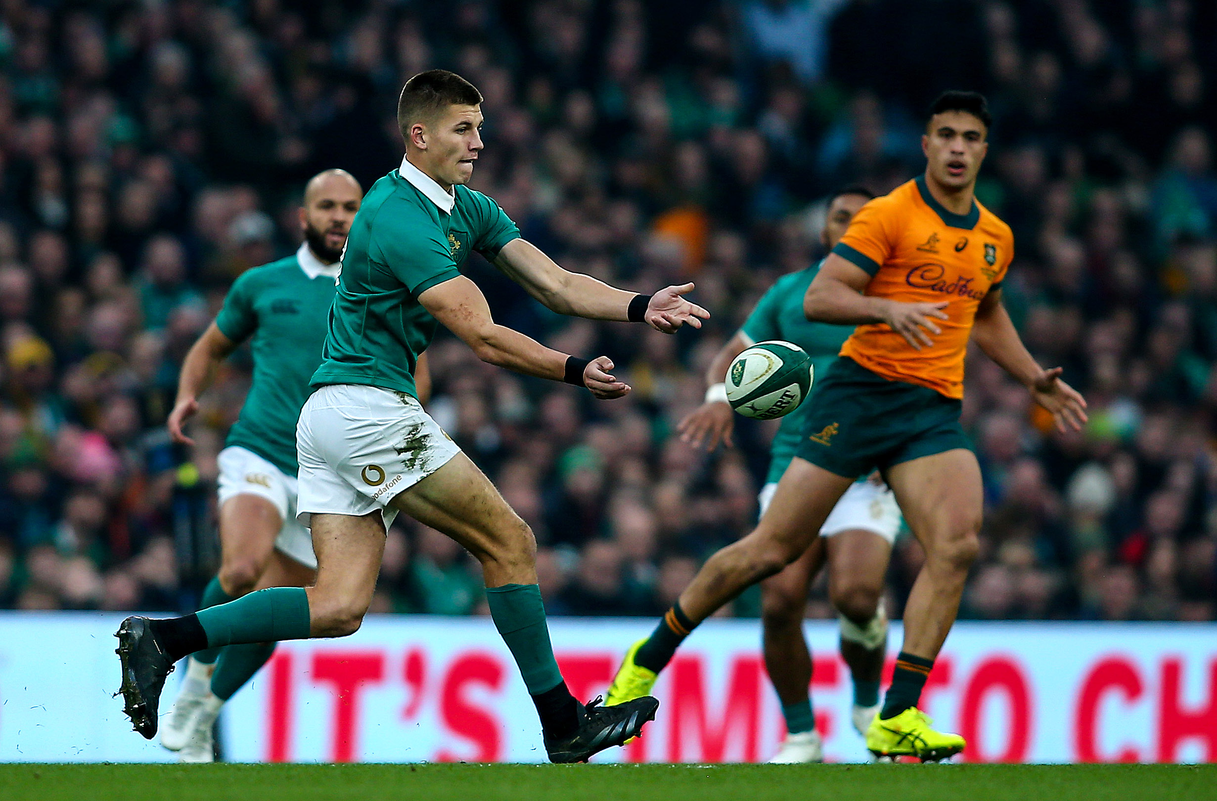 Ireland's Sam Prendergast passes the ball during the 2024 Autumn Nations Series match against Australia at the Aviva Stadium.