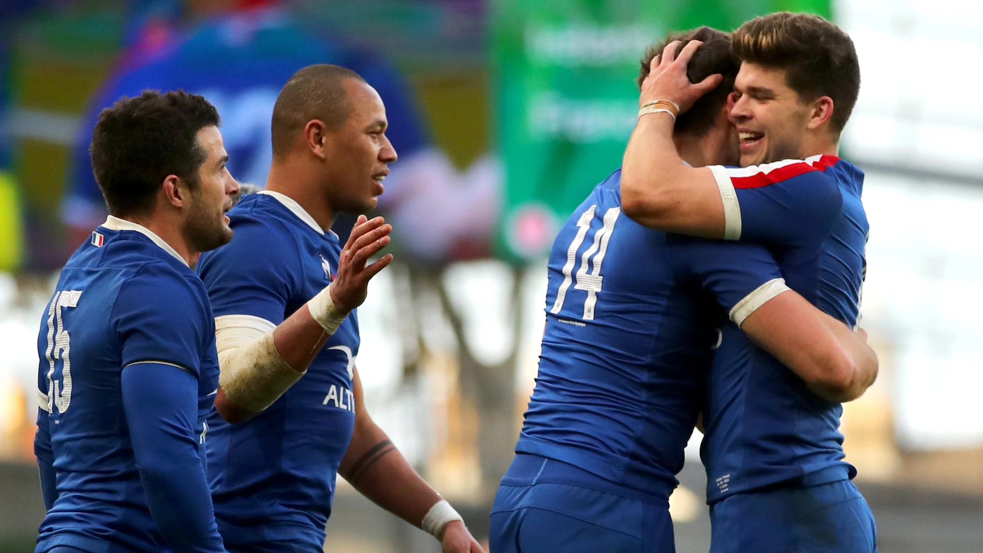 Brice Dulin, Gael Fickou and Matthieu Jalibert celebrates with try scorer Damian Penaud 14/2/2021