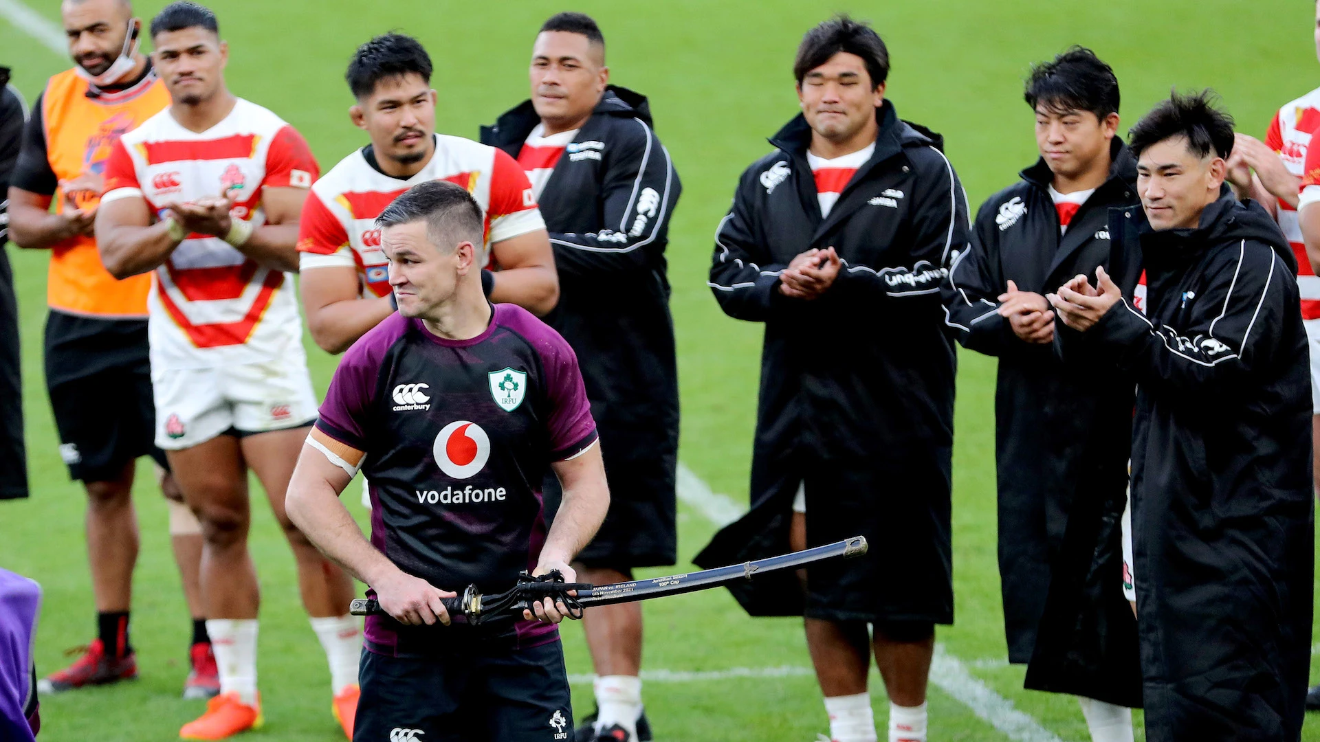 Johnny Sexton celebrates after being presented with a ceremonial sword from the Japan team after winning his 100th cap for Ireland 6/11/2021