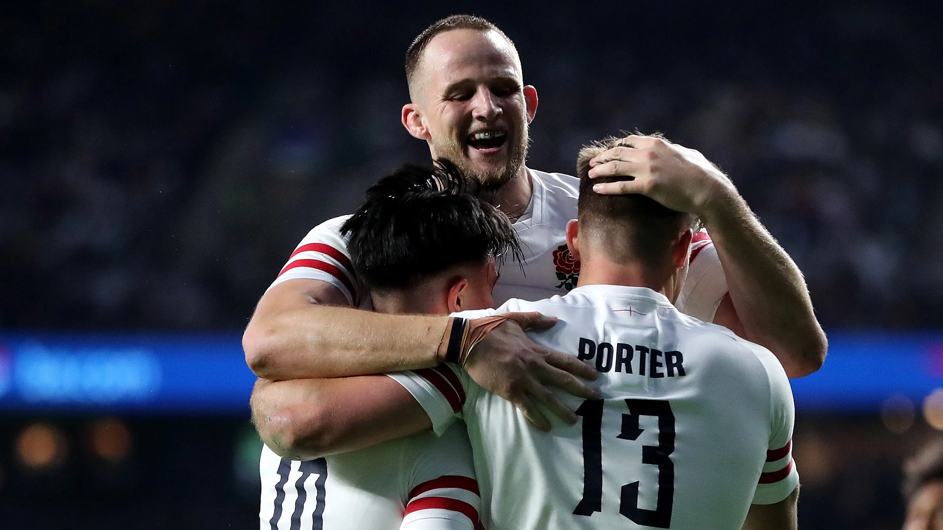 Guy Porter celebrates scoring a try with Jonny Hill and Marcus Smith12/11/2022