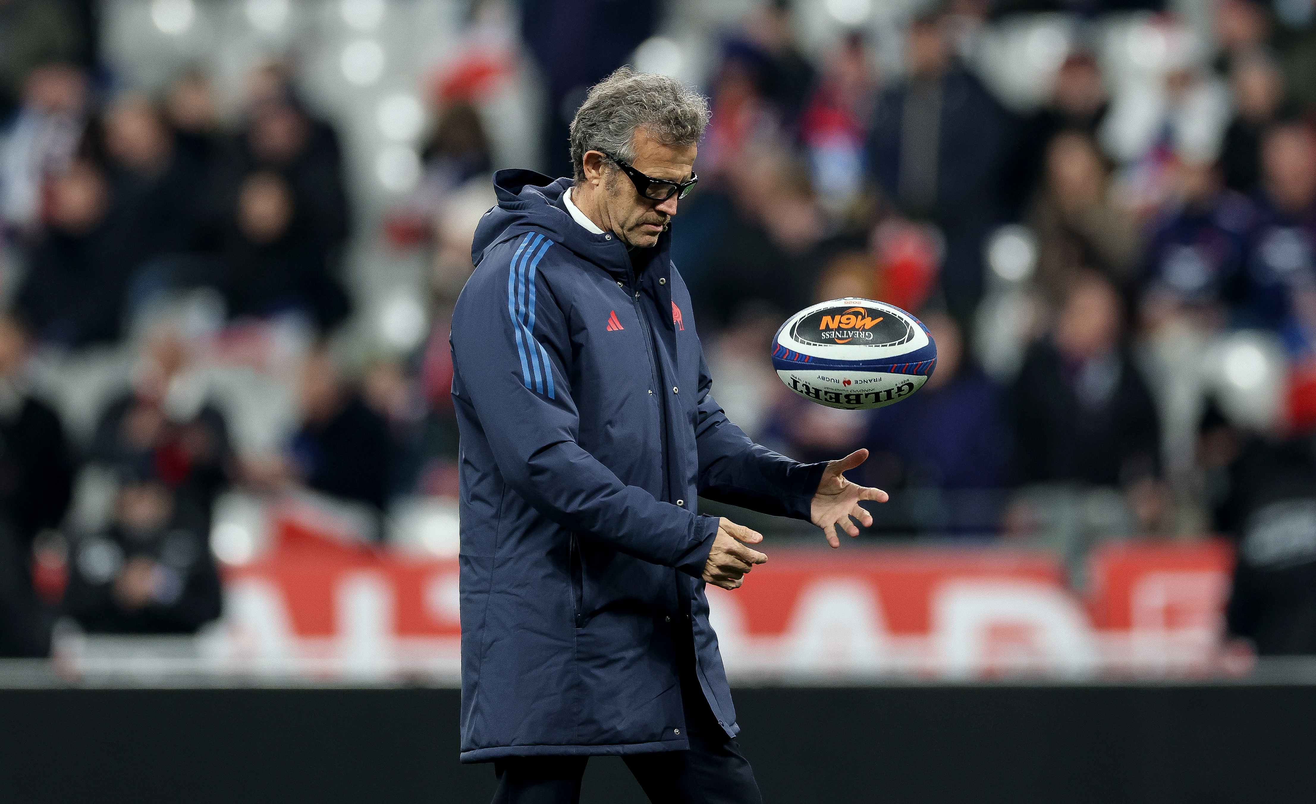 France head coach Fabien Galthié throws up a Six Nations ball ahead of the title decider against Scotland in 2025.
