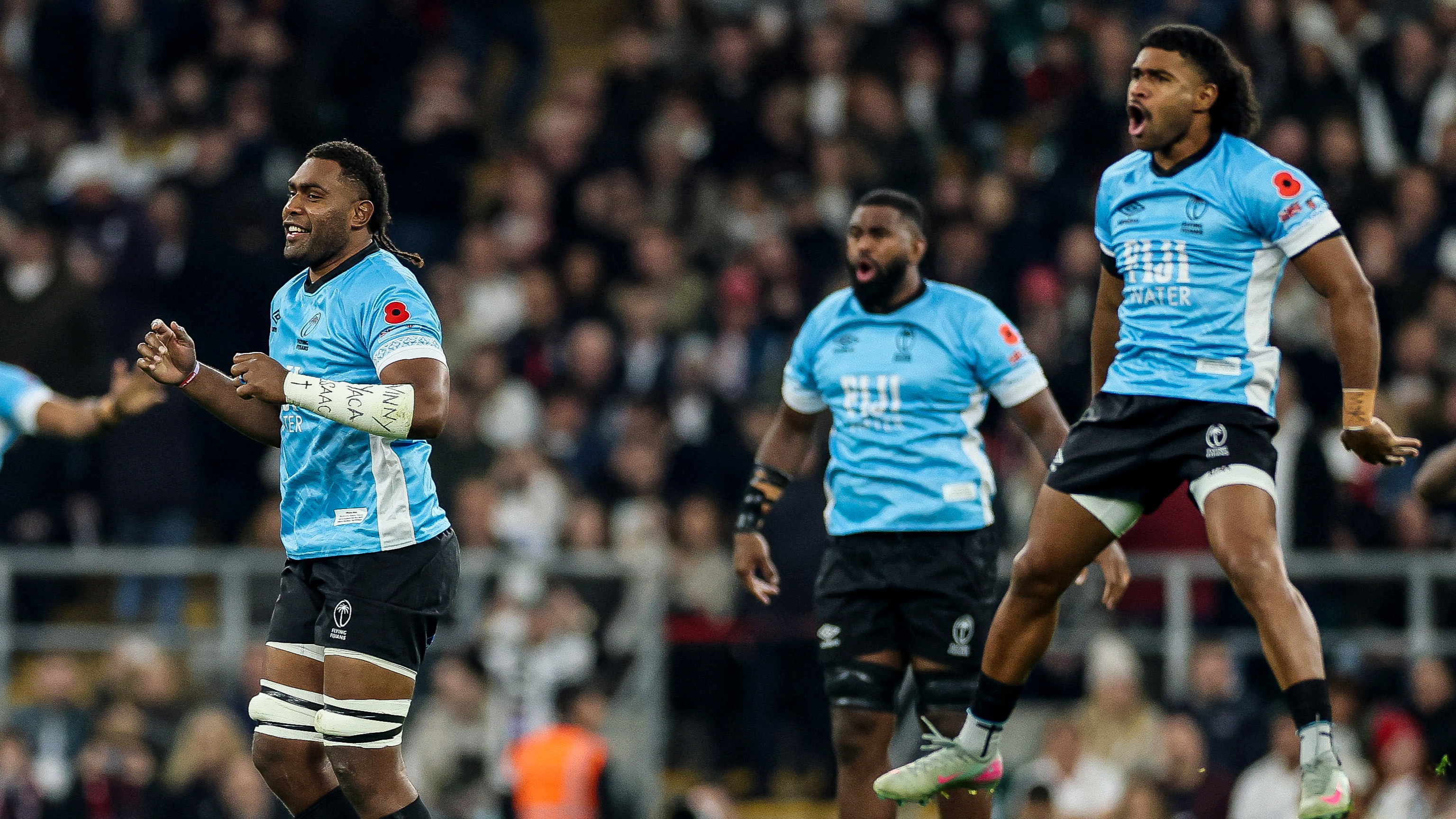 Fiji's Viliame Mata, Temo Mayanavanua and Simi Kuruvoli leap into the air ahead of the 2025 Quilter Nations Series game against England at Allianz Stadium.