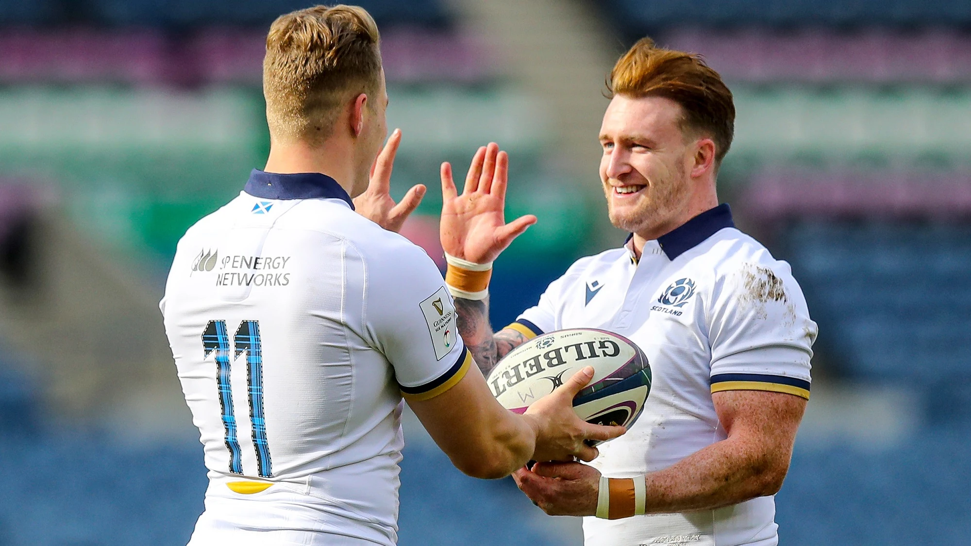 Duhan Van der Merwe celebrates after scoring a try with Stuart Hogg 20/3/2021