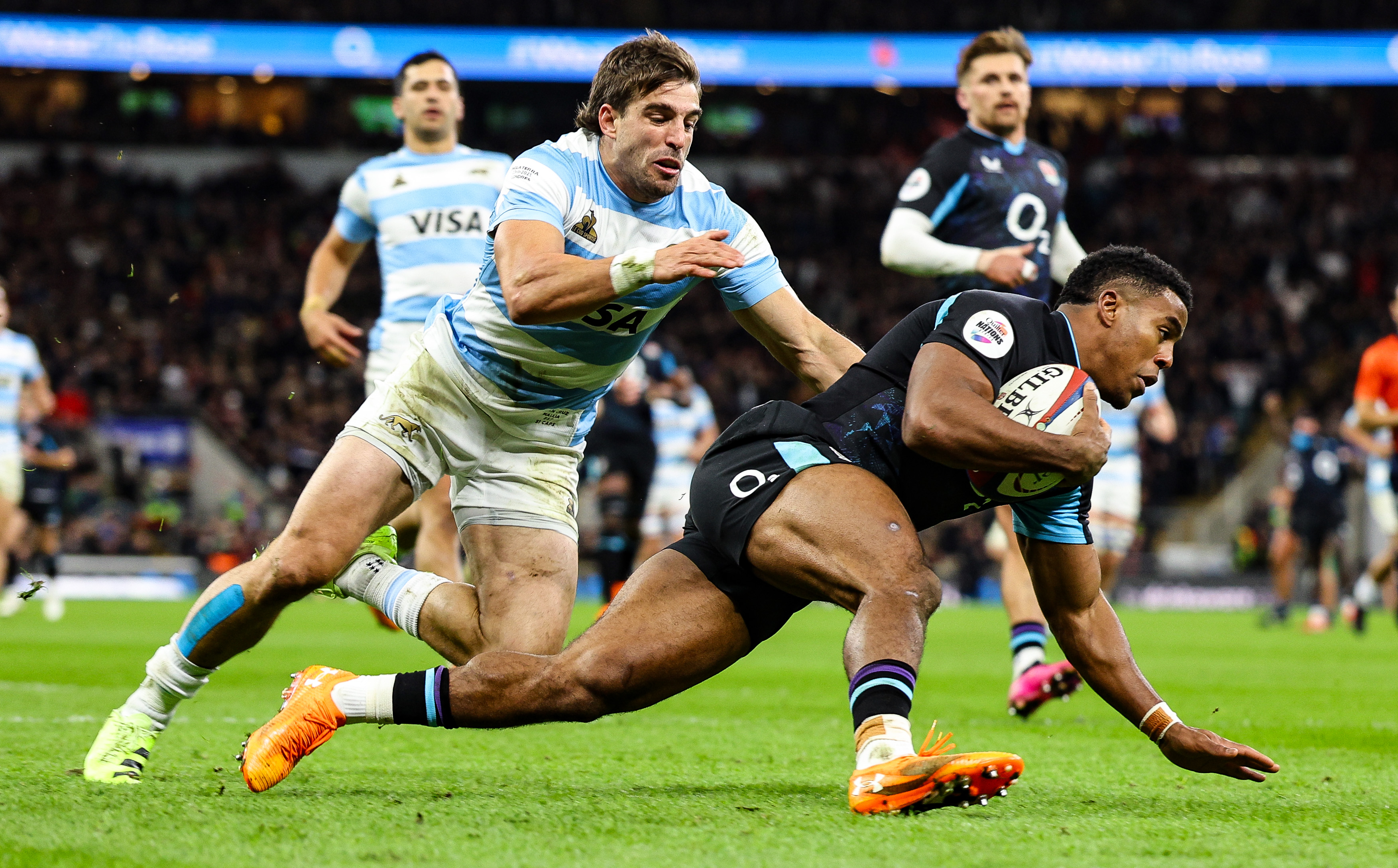 England's Immanuel Fey-Waboso dives over for his side's second try of the match against Argentina during the 2025 Quilter Nations Series.
