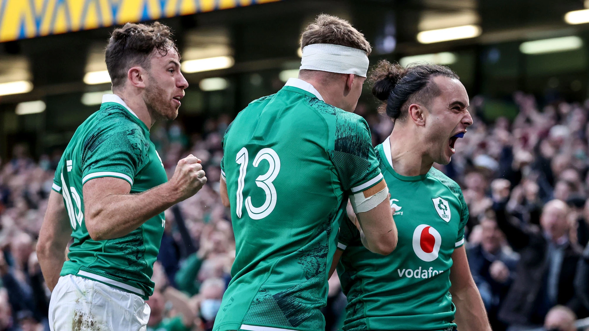 James Lowe celebrates after scoring the opening try with Hugo Keenan and Garry Ringrose 13/11/2021