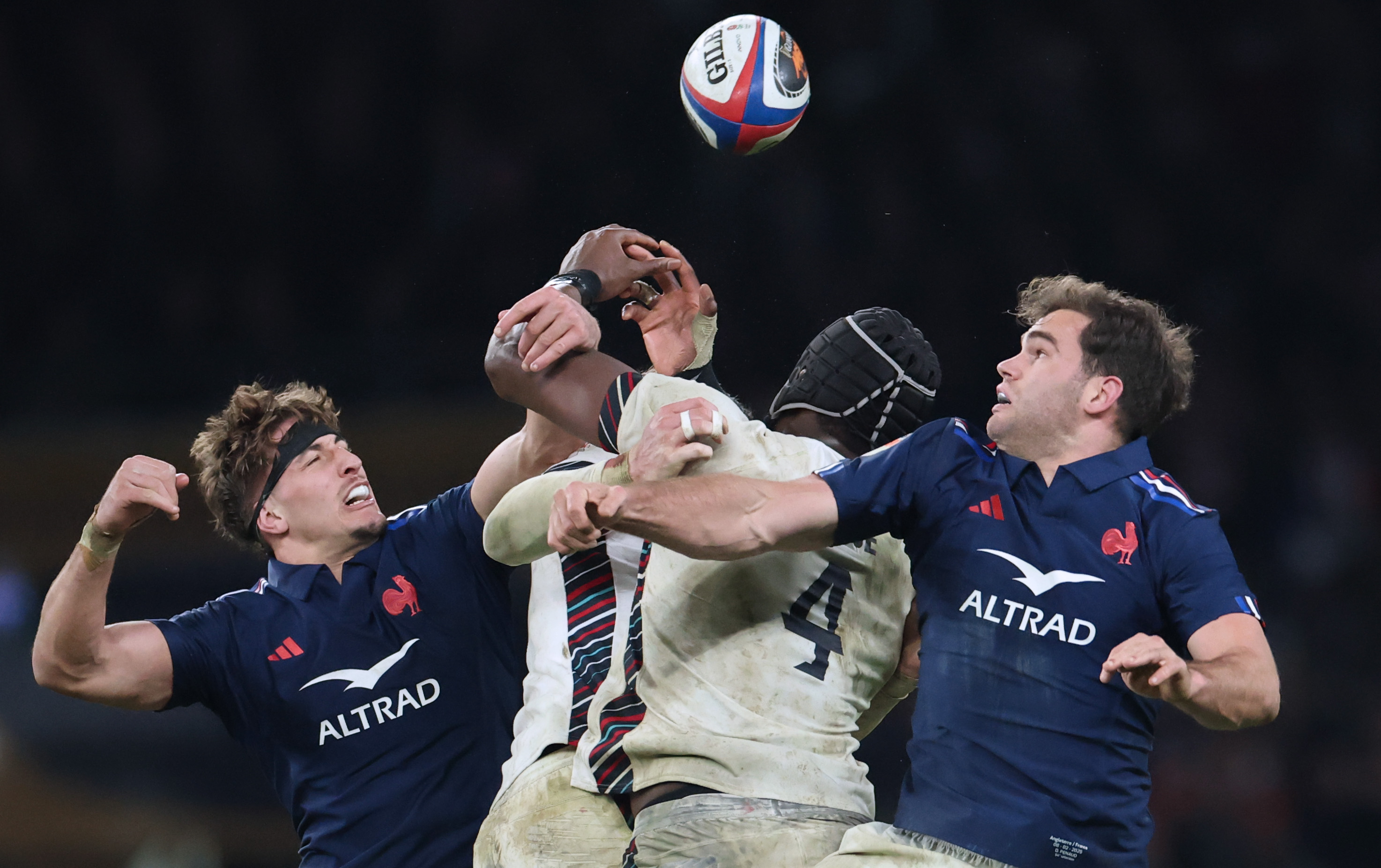 France's Oscar Jegou and Damian Penaud vie with England's Maro Itoje for the ball during the 2025 Guinness Men's Six Nations.