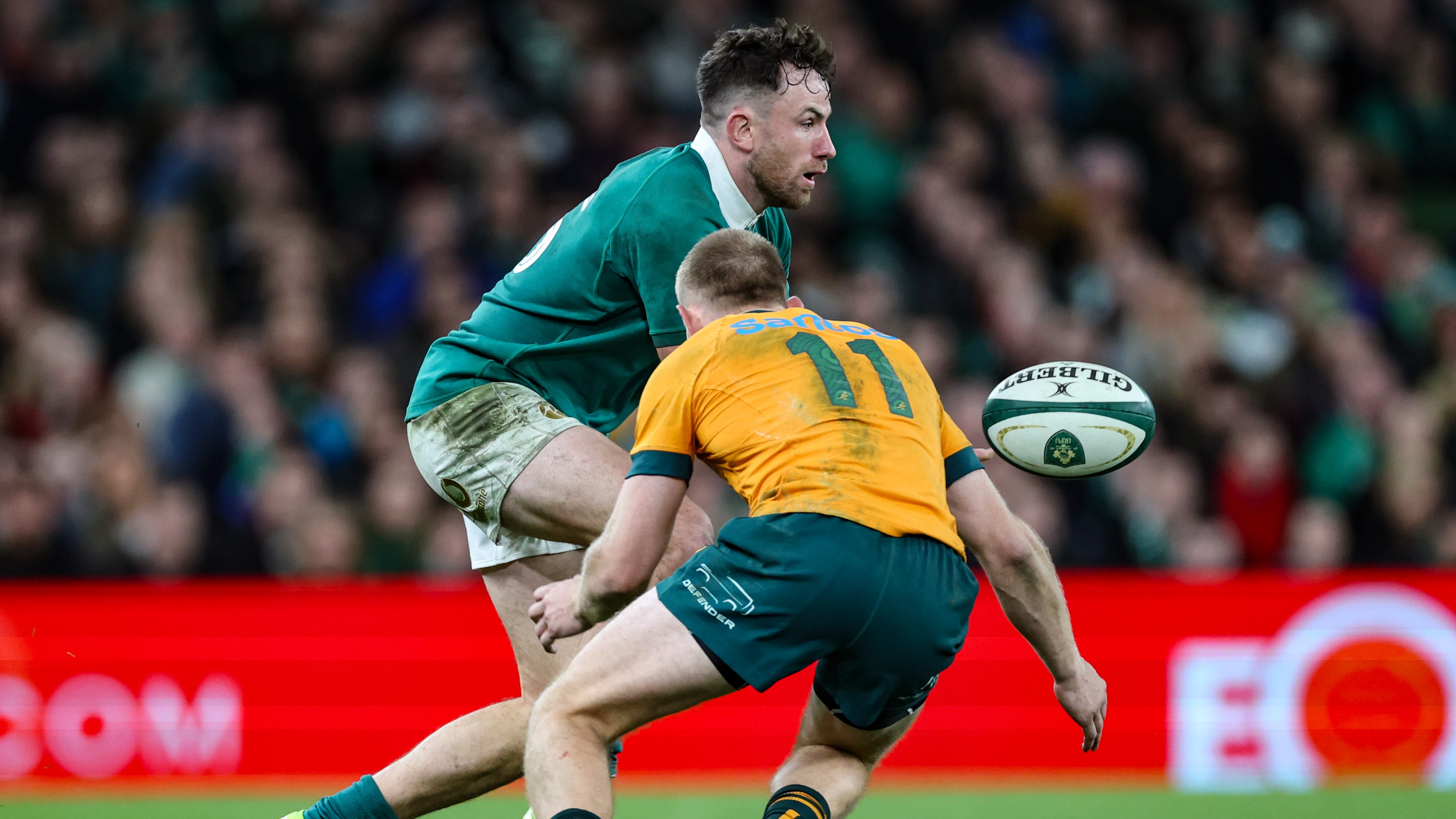 Max Jorgensen tackles Hugo Keenan during Ireland v Australia in the 2024 Autumn Nations Series.