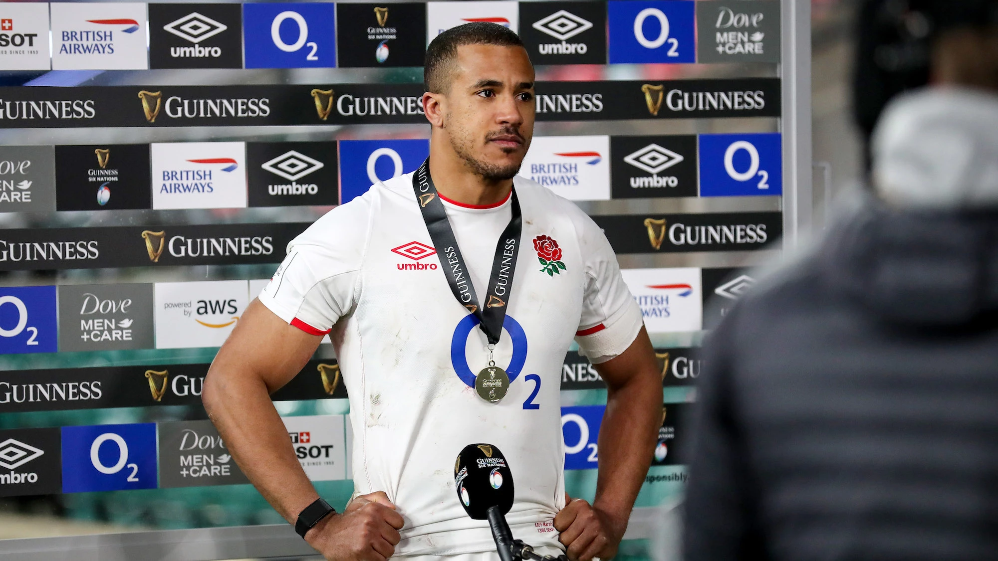 Anthony Watson is presented with the Guinness Six Nations Player of the Match Award after the game 13/3/2021