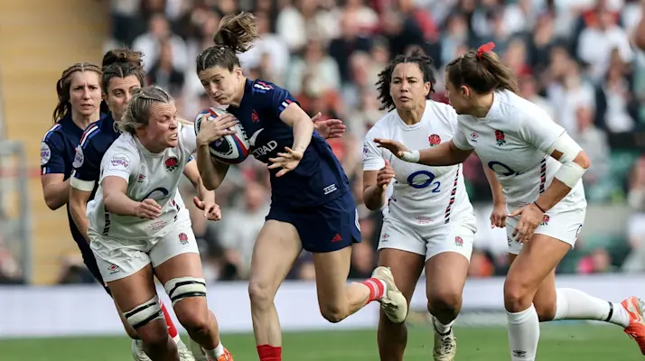 England's Zoe Aldcroft with Morgane Bourgeois of France during the 2025 Guinness Women's Six Nations Championship Round 5 game