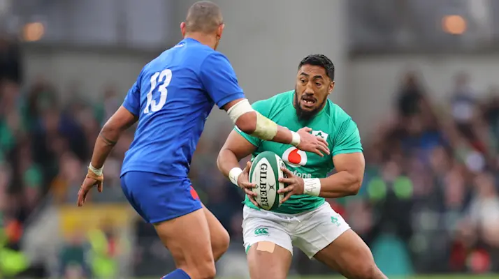 Bundee Aki runs at Gael Fickou