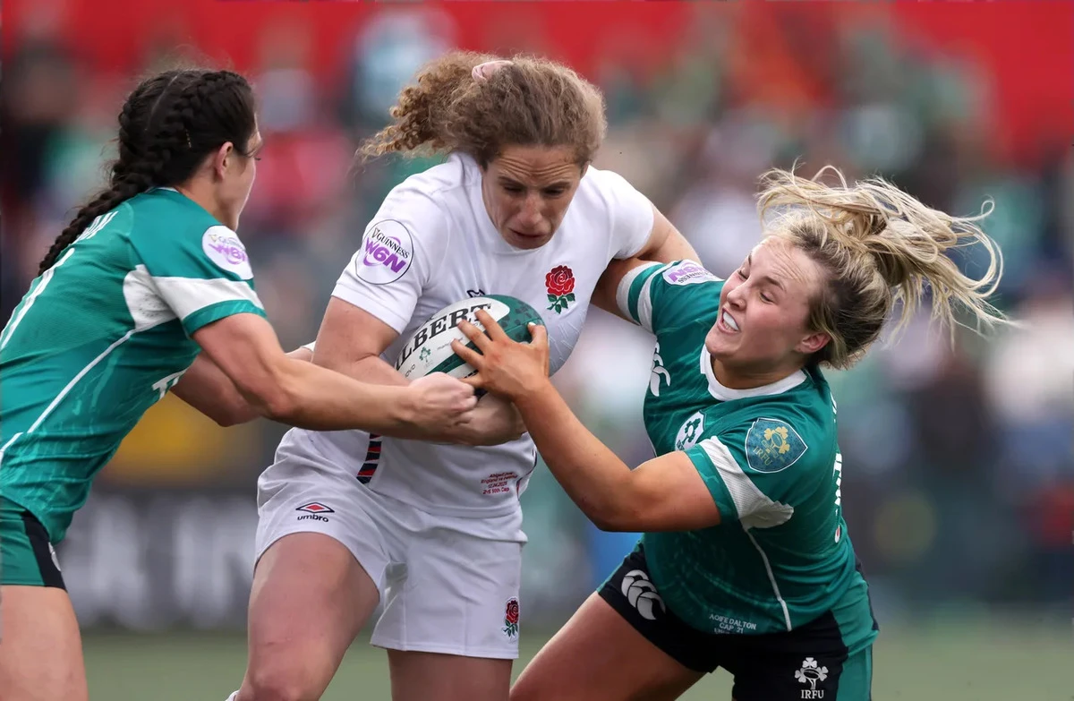 England's Abby Dow tackled by Aoife Dalton of Ireland, 2025