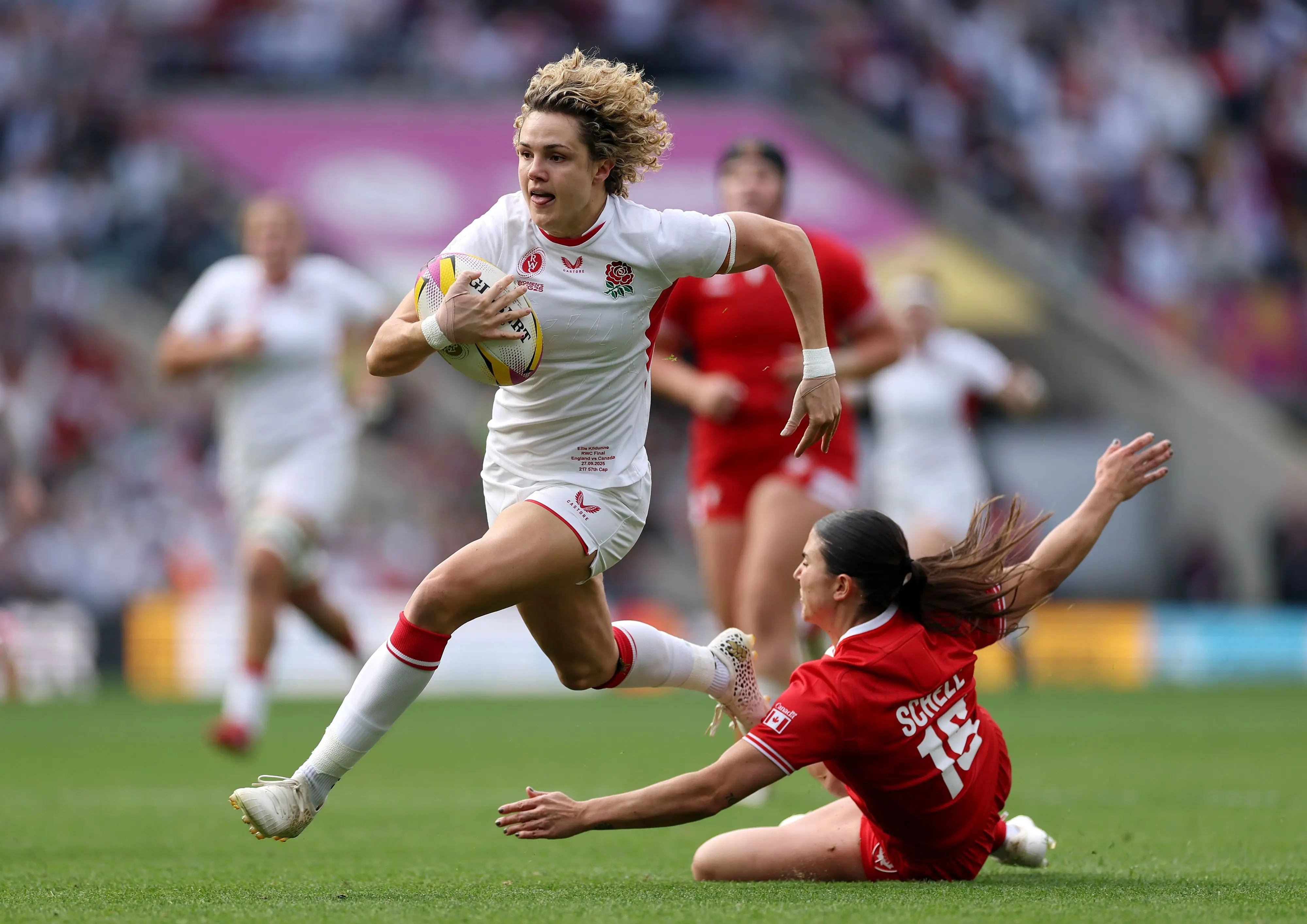 Ellie Kildunne of England races clear to score her team's first try during the Women's Rugby World Cup 2025 Final match between Canada and England at Allianz Stadium.
