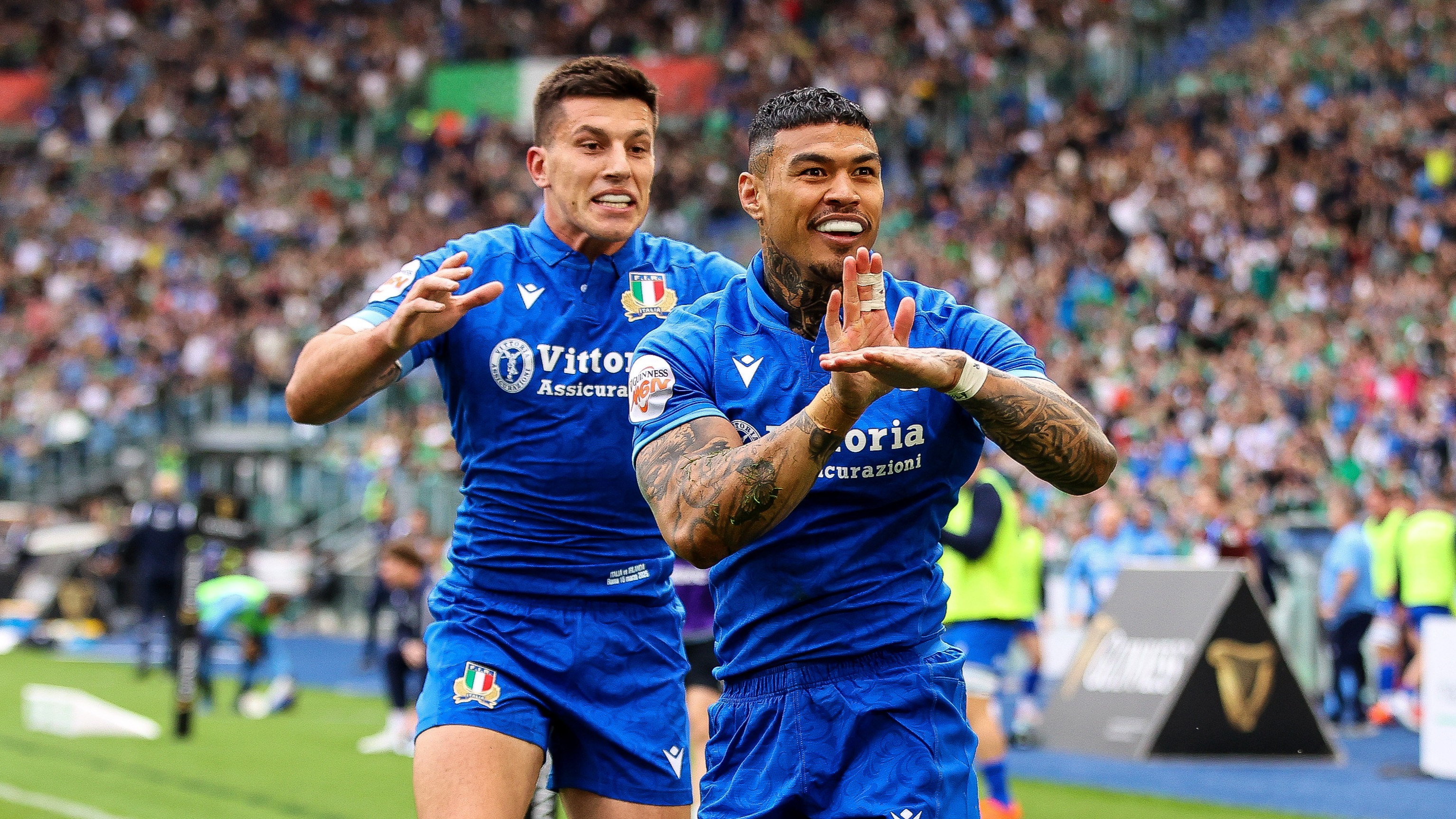 Italy's Monty Ioane celebrates a try during the 2025 Guinness Men's Six Nations game against Ireland in Rome.
