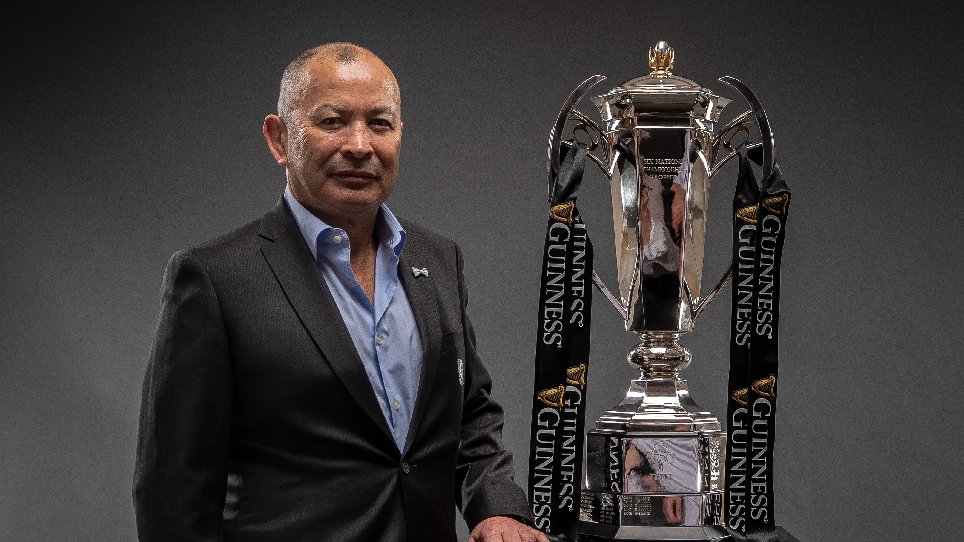 Eddie Jones poses with the Six Nations trophy in 2019.