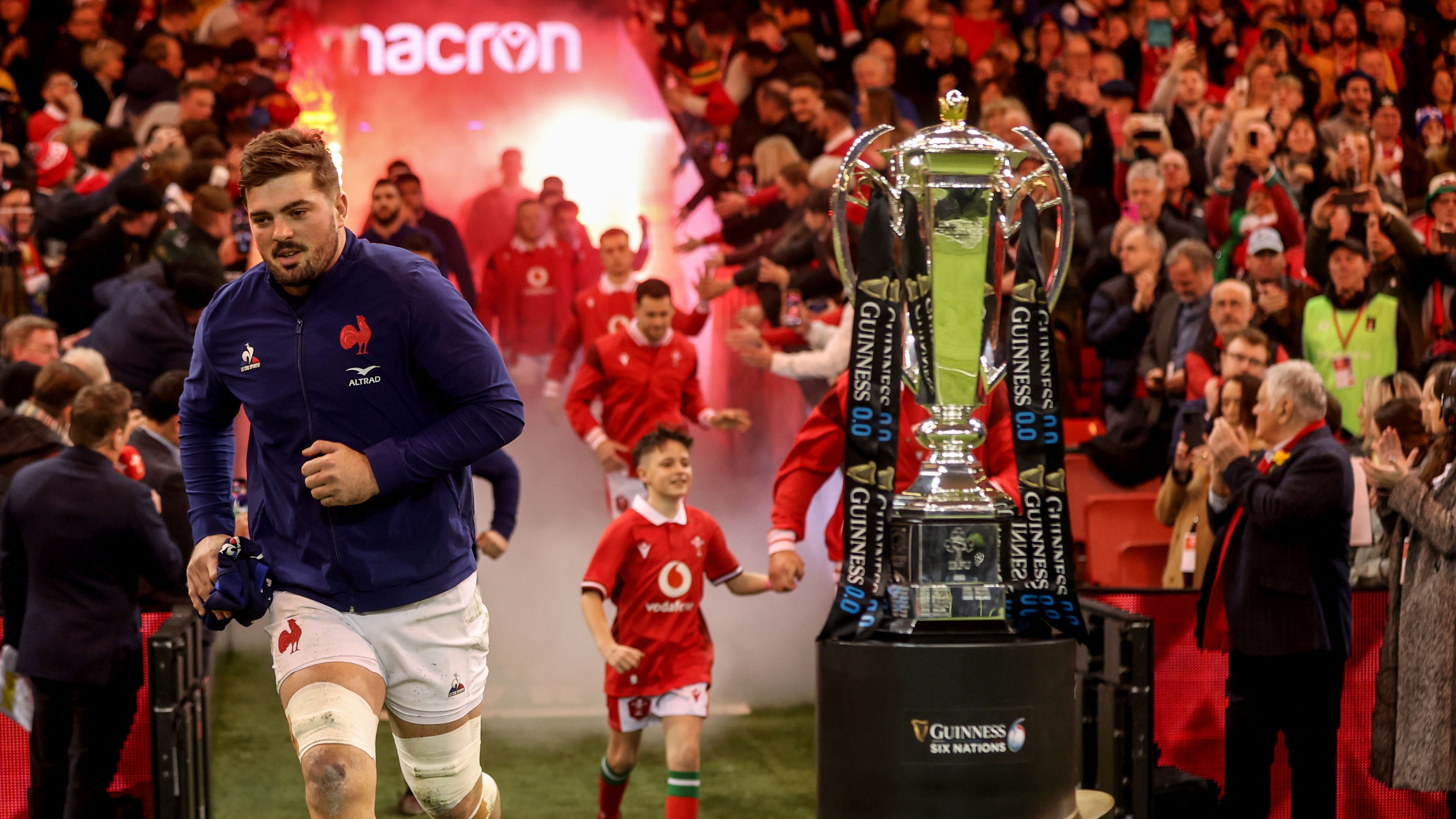 France's Gregory Alldritt leads his side out past the Six Nations trophy ahead of the 2024 Guinness Men's Six Nations Championship match against Wales.