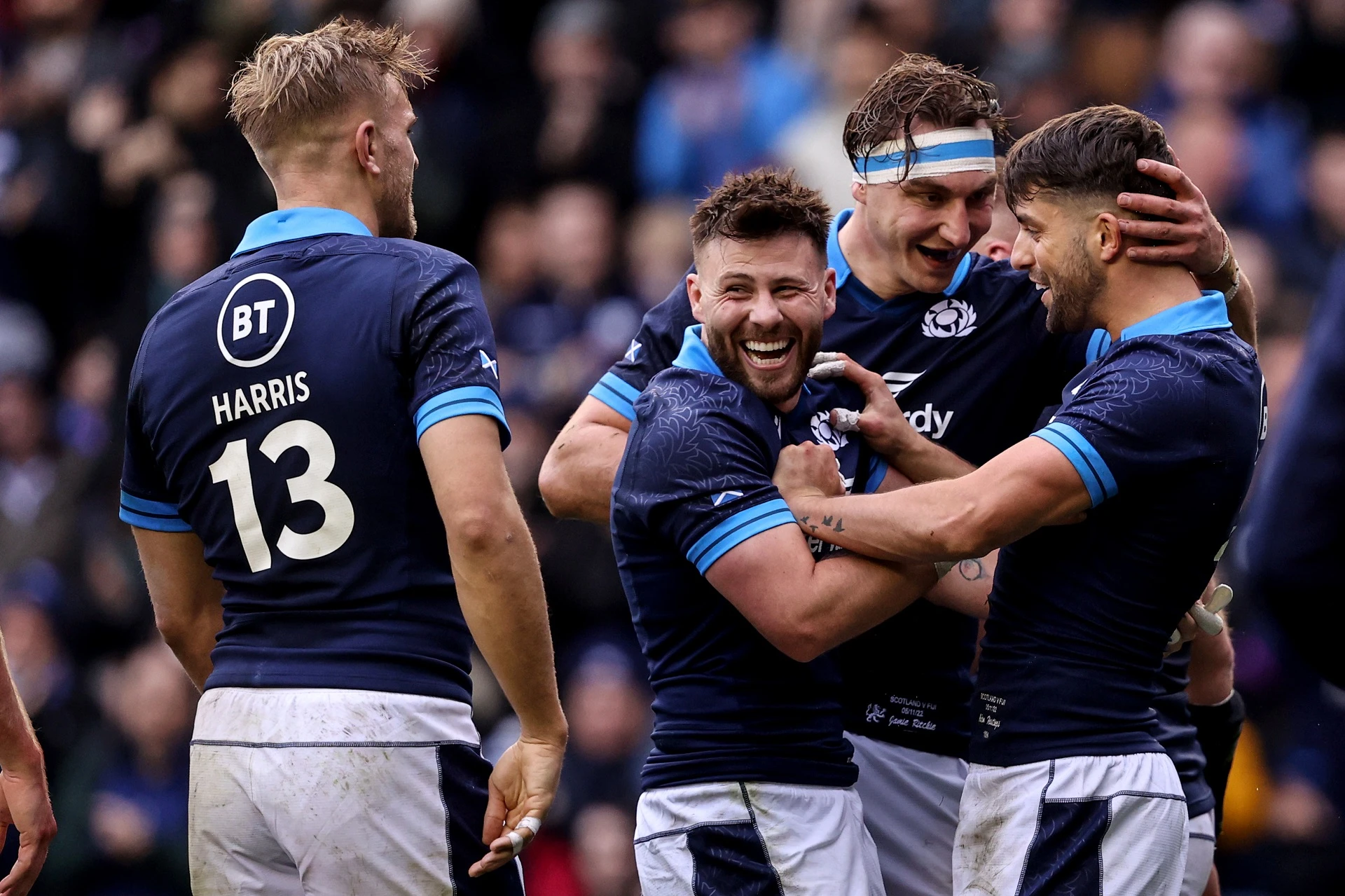 Chris Harris, Ali Price and Jamie Ritchie celebrate with try scorer Adam Hastings 5/11/2022