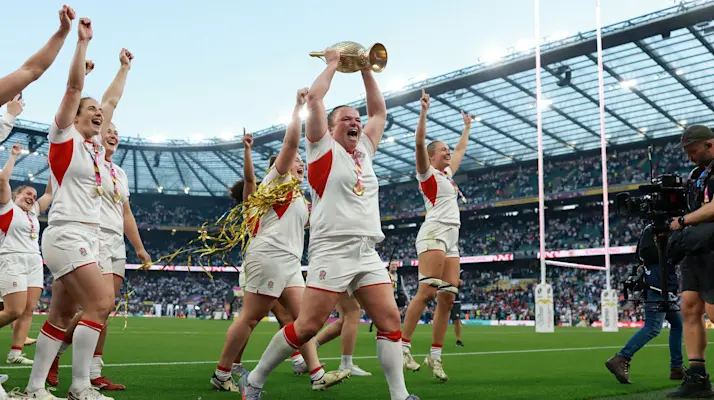 Sarah Bern of England celebrates with the trophy following victory in the Women's Rugby World Cup 2025 Final match between Canada and England at Allianz Stadium