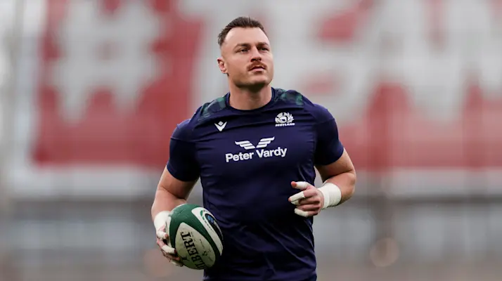 Scotland’s Jack Dempsey warms-up ahead of the 2024 Guinness Six Nations Championship