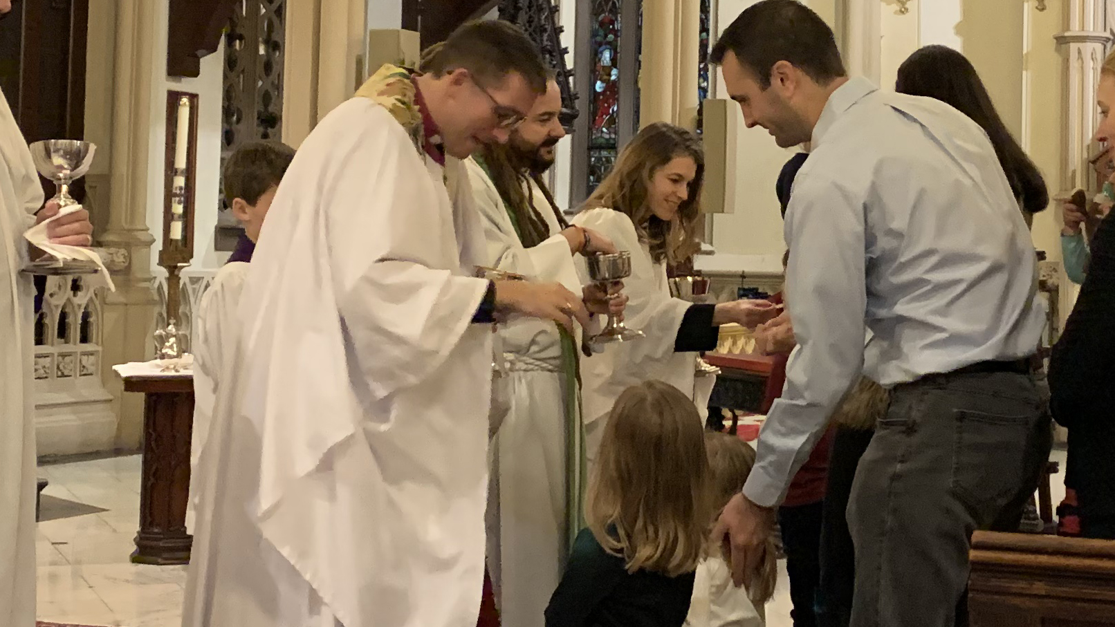 An image of children receiving communion at the cathedral