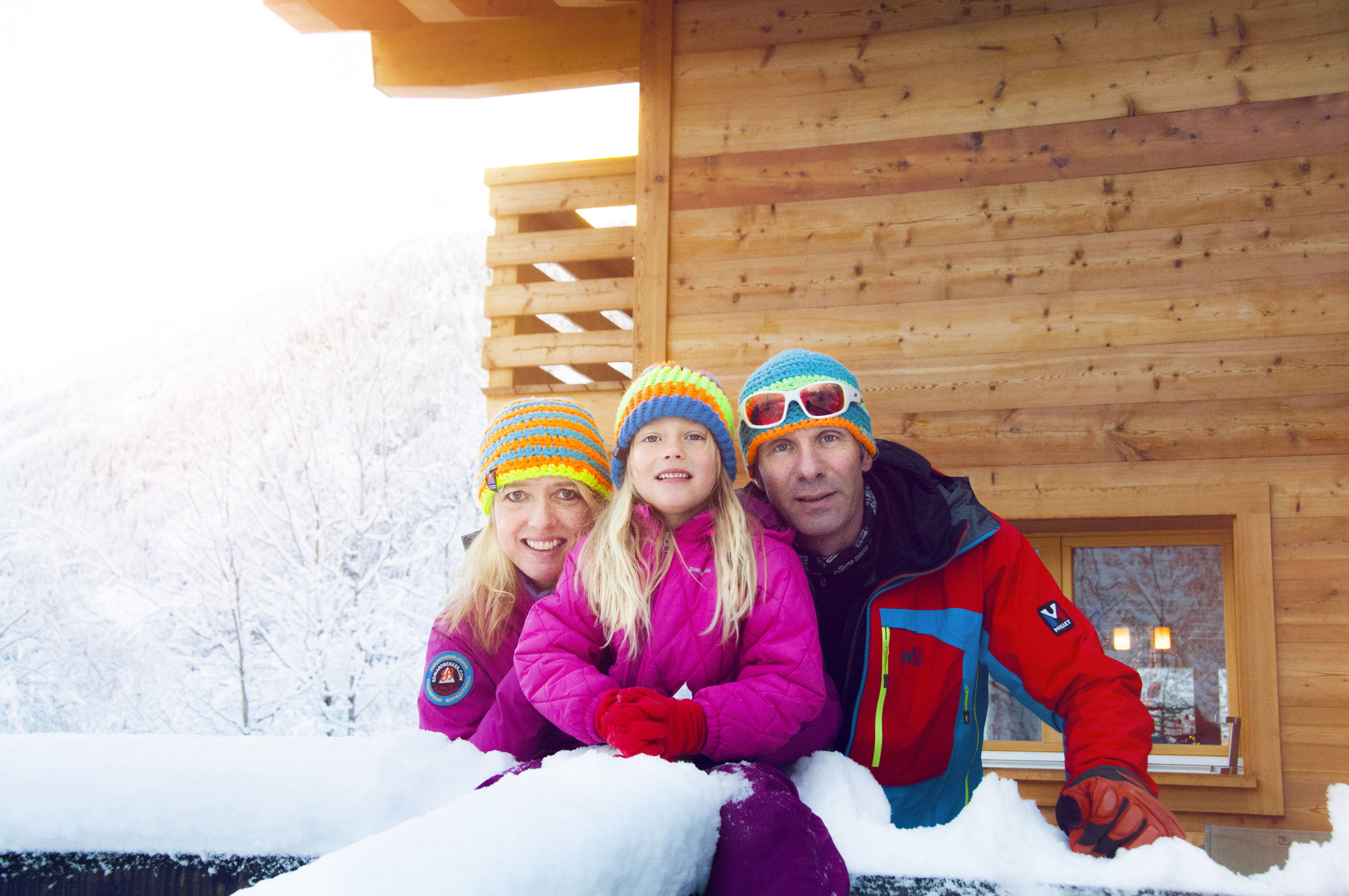 Family on a terrace in winter, Valais