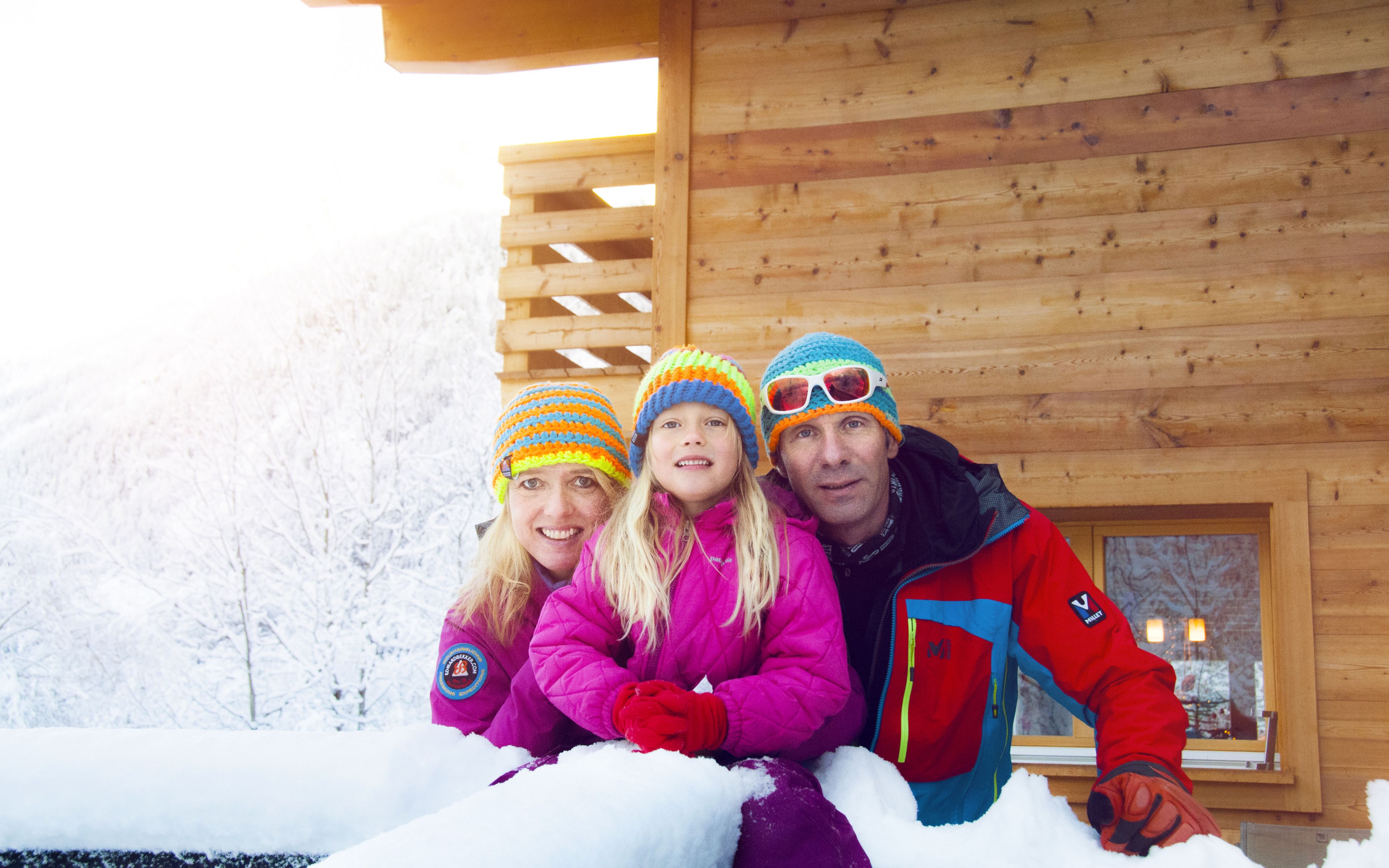 Family on a terrace in winter, Valais