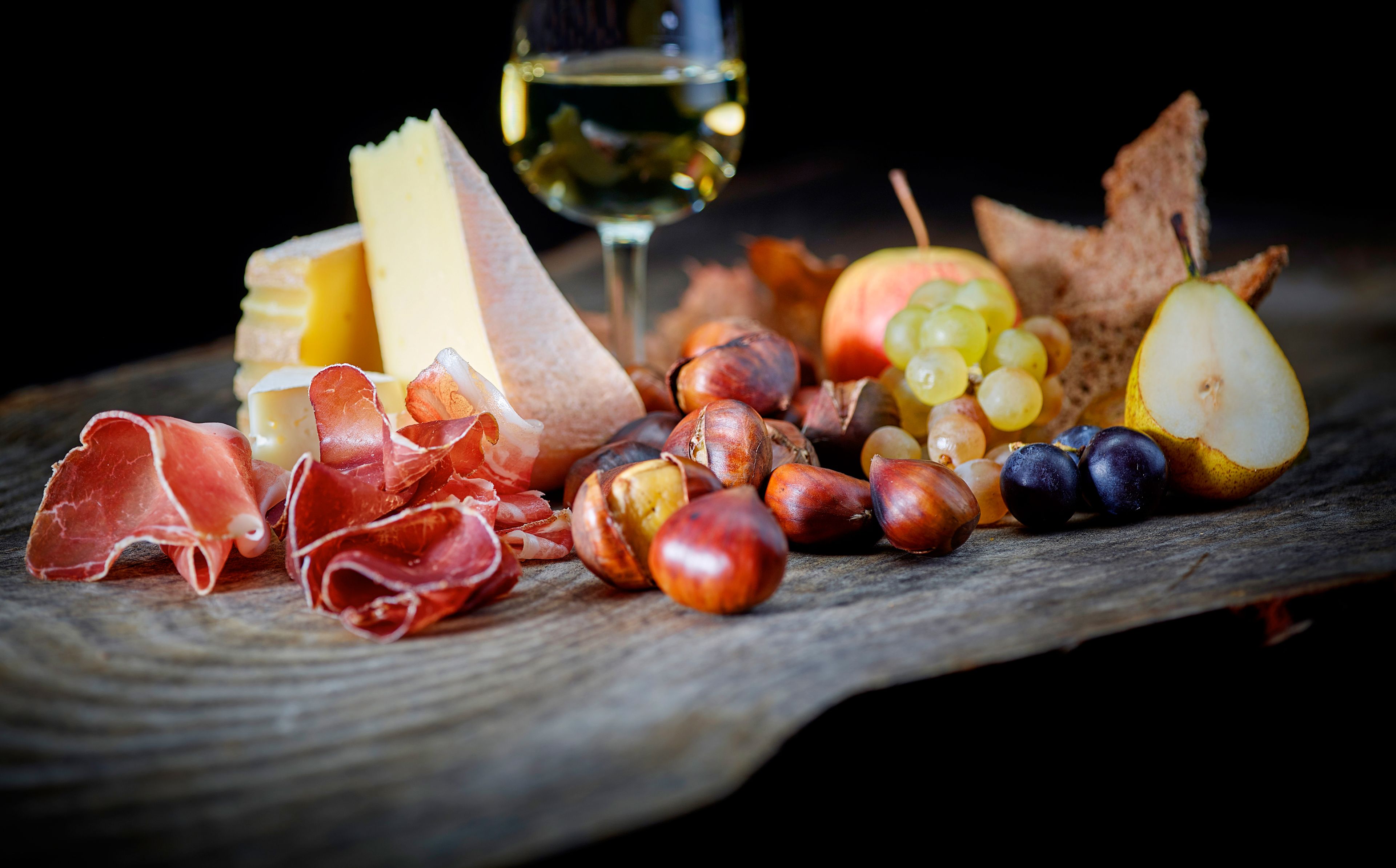 Brisolée, hot chestnuts with Valais dried meat, cheese and fruit, local speciality from Valais